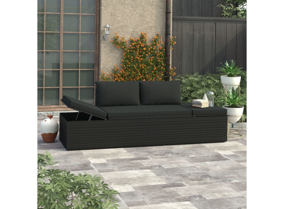 Schwarze Polyrattan-Sonnenliege mit Kissen