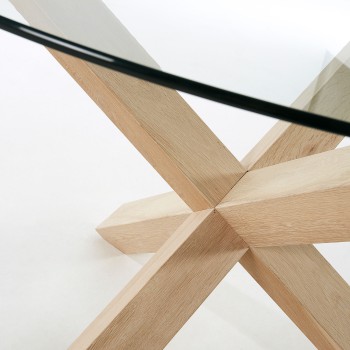 Ronde Lotus tafel van glas met houten poten.