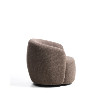 Odenia vridbar fåtölj i micro bouclé